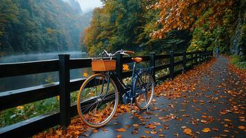 Serene Autumn Bicycle Ride by Lake Beautiful fall foliage scenic bike path near calm water photo