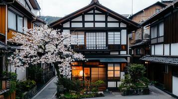 Charming Japanese House with Cherry Blossoms in Springtime Traditional Architecture and Scenic Street View photo