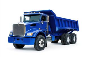 A blue dump truck designed for transporting and unloading materials. photo