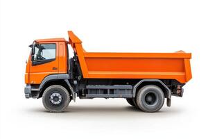 A side view of an orange dump truck designed for transporting materials. photo