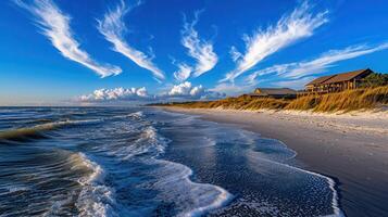 Stunning Coastal Scene Beach House Ocean Waves Sandy Shore Dramatic Sky photo