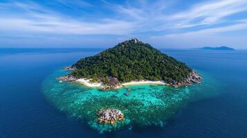 Tropical Island Paradise Aerial View of Lush Green Island with Pristine Beach and Turquoise Waters photo