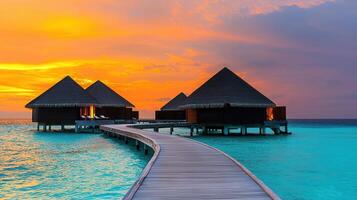 Stunning Sunset Overwater Bungalows Tropical Island Paradise Vacation Resort photo