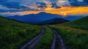 Majestic Sunset Over Mountain Range Scenic Dirt Road Summer Landscape photo