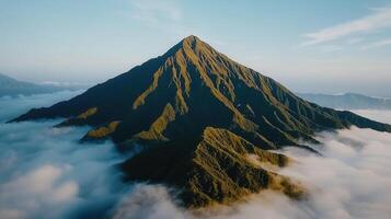 Majestic Mountain Peak Soaring Above Cloudscape Scenic Nature Landscape View photo
