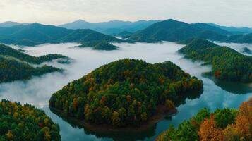 Serene Autumn Landscape Misty Mountains and Colorful Foliage Overlooking a Calm Lake photo