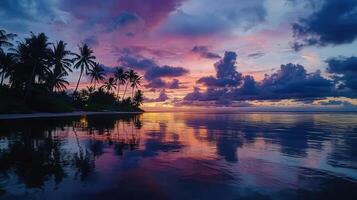 Serene Tropical Sunset Palm Trees Silhouetted Against Vibrant Sky Reflecting on Calm Ocean Waters photo