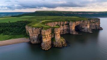 Dramatic Aerial View of Coastal Cliffs Dramatic Oceanside Cliffs Seascape Stunning Coastal Rock Formation photo