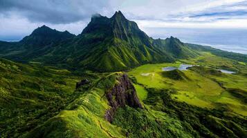 Majestic Green Mountains and Lush Valley Ocean View Panoramic Landscape photo