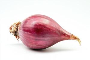 A single red onion on a plain background, showcasing its smooth, shiny skin photo