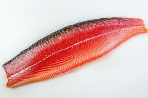 A fillet of salmon showcasing its vibrant colors and texture. photo