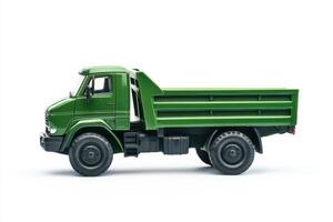A green dump truck viewed from the side, showcasing its utility and design. photo