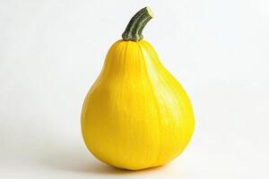 A bright yellow squash with a green stem, showcasing its smooth texture and vibrant color photo