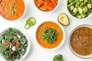 A colorful array of healthy dishes including soups, salads, and vegetables photo