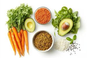 A colorful assortment of fresh vegetables, legumes, and grains arranged for a healthy meal photo