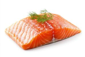 A fresh salmon fillet garnished with a sprig of dill, ready for cooking or presentation. photo