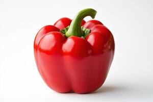 A vibrant red bell pepper on a plain background, showcasing its glossy texture and shape photo