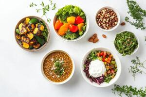 A vibrant assortment of healthy dishes featuring salads, vegetables, and lentil soup photo