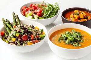 A colorful array of healthy dishes including salads, soups, and grains photo