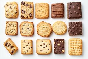 A variety of cookies arranged in a grid pattern, showcasing different shapes and flavors photo