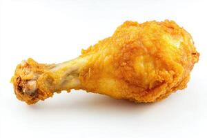 A crispy fried chicken drumstick on a white background. photo