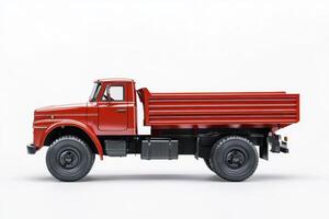 A red dump truck with a flatbed, designed for transporting materials. photo