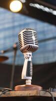 Retro microphone on stage with bokeh light photo