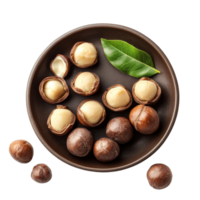 Fresh macadamia nuts displayed on a dark plate with a green leaf on a clean transparent background, macadamia nuts in plate on transparent background png