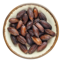 A top view of date palm fruits in a round plate isolated against a clean transparent background showcasing natural textures and colors, date palm in a plate isolated on transparent background png