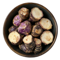 Fresh taro root cut into pieces displayed in a rustic plate on a simple transparent background, taro root in plate on transparent background png