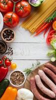 Various vegetables and meat on a wooden table photo