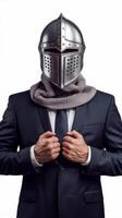 Creative image a man in a suit of a businessman a knights helmet on his head on a white background the concept of a modern hero overcoming difficulties crisis management magazine style photo