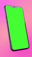 Animated of a smartphone with a green screen, ideal for editing or using chroma key in videos on a pink vertical background