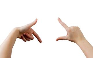 Female hands forming a square framing gesture, thumbs and index fingers creating a visual crop to photo