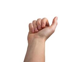 Female hand with neatly manicured nails, fingers slightly curled in a subtle beckoning or grasping photo