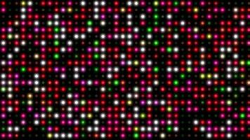 A colorful array of dots on a black background video