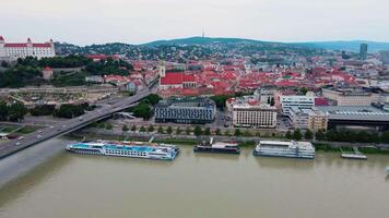 Aerial view of UFO Bridge , Most SNP over Danube River in Bratislava, Slovakia. Observation tower on top of modern cable-stayed bridge with panoramic views in European city video