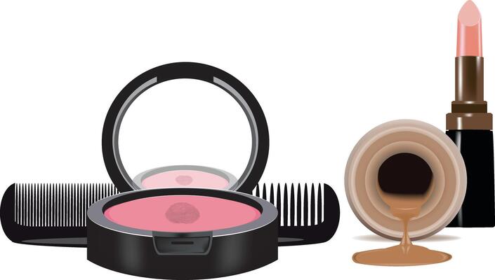 Makeup brushes and cosmetics on a white background