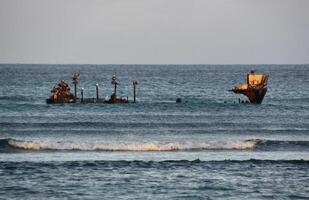 Remains of a Shipwreck Off the Coast of Aruba photo