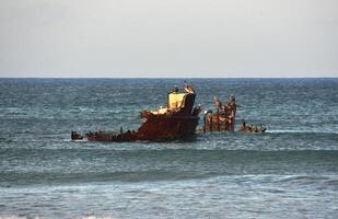 Shipwreck in Shallow Waters in Aruba photo