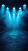 Dance floor illuminated by blue stage lights creating a vibrant atmosphere for performers photo
