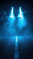 Dramatic lighting and fog create an atmospheric view of an empty road at night photo