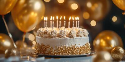 Celebration cake with candles and golden decorations at a festive event photo