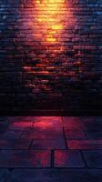 Textured brick wall illuminated by warm red light creating a dramatic atmosphere in an urban setting photo