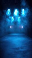 Mysterious corridor illuminated by blue lights with fog creating a dramatic atmosphere at night photo