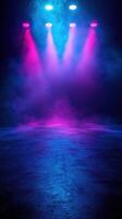 Colorful stage lighting creates a vibrant atmosphere for a performance in a darkened venue photo