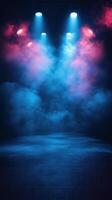 Colorful smoke and spotlight effects create a vibrant atmosphere for performances in a dimly lit space photo