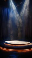 Spotlight illuminates empty stage in dramatic theater setting with blue curtains and glowing platform photo
