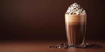 Delicious creamy chocolate drink topped with whipped cream and cocoa on a dark background photo
