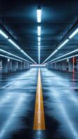Modern underground parking lot illuminated by bright lights and wet floor reflections photo